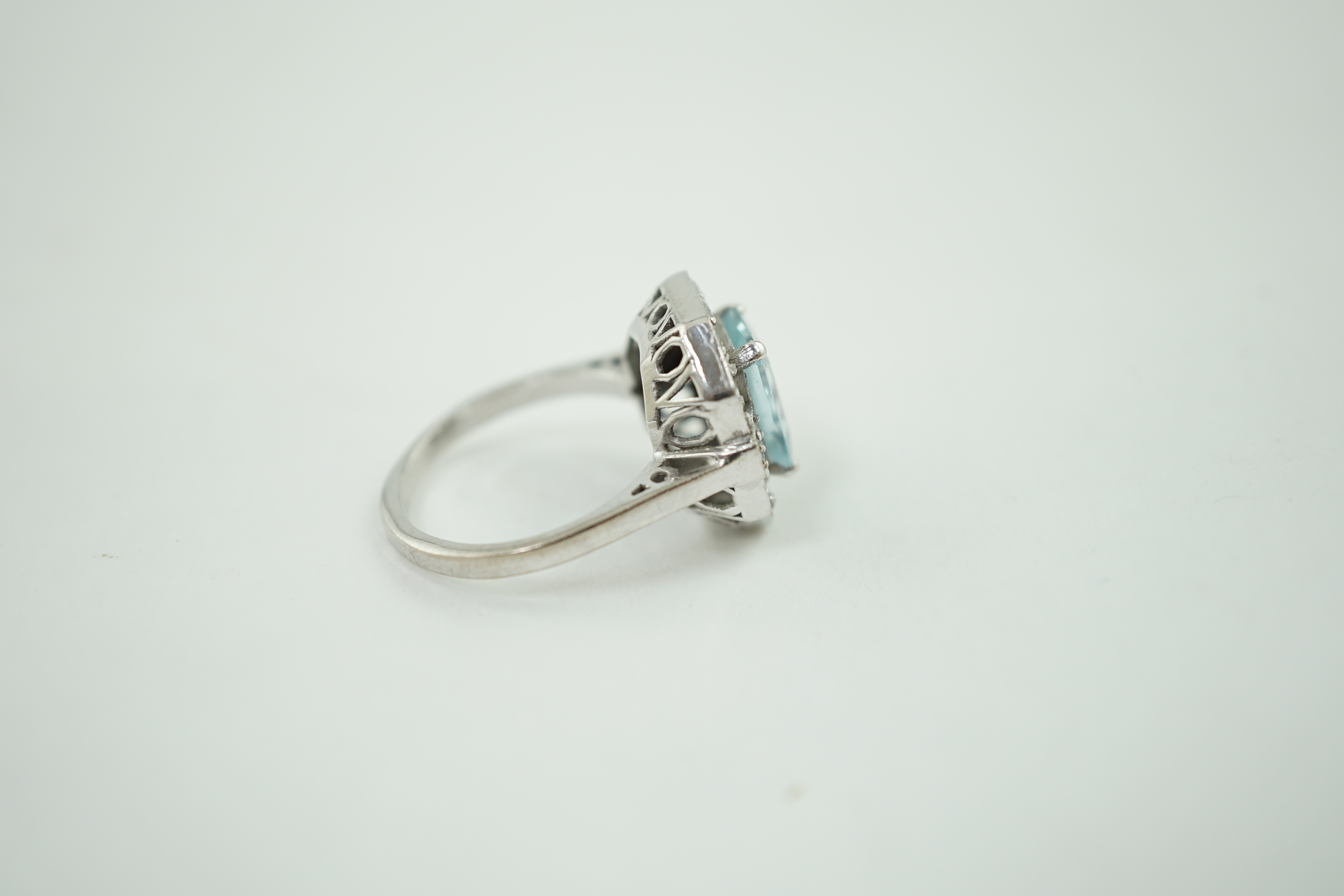 An Art Deco style white gold?, aquamarine and diamond cluster set octagonal dress ring